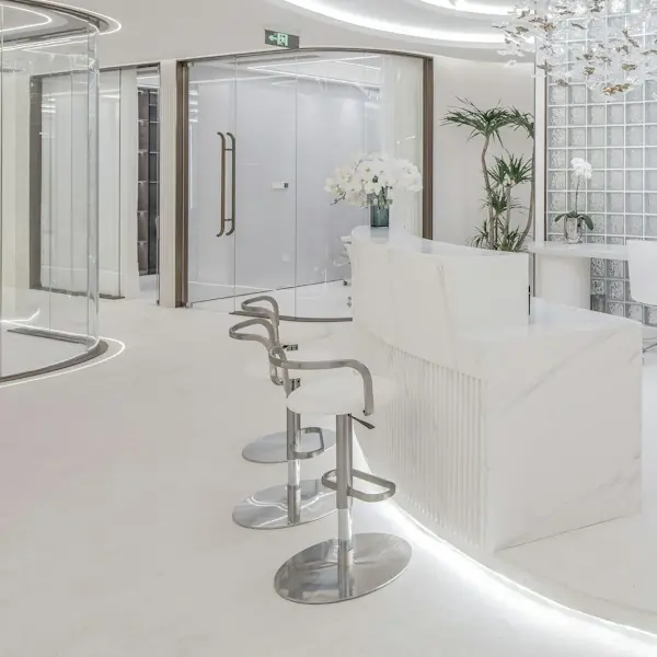 Bright white reception desk in a modern clinic